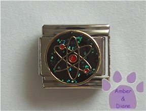 Atomic Energy Symbol Italian Charm on a black glitter disc