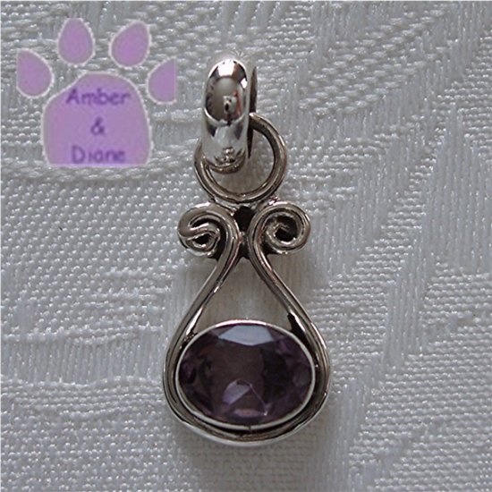 Amethyst Oval Sterling Silver Pendant in a simple frame