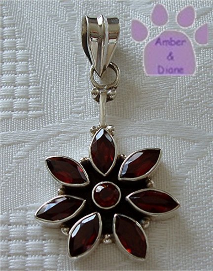 Faceted Garnet Flower Sterling Silver Pendant with garnets