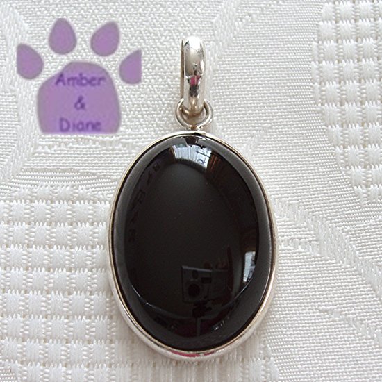 Onyx Sterling Silver Pendant Black Oval in a simple silver frame