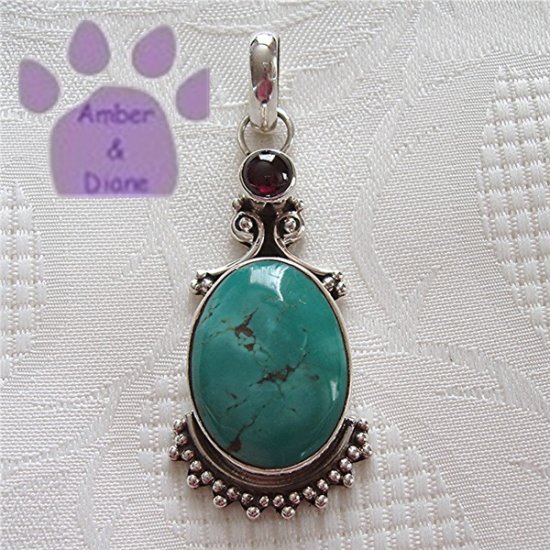 Turquoise Oval and Garnet Round Sterling Silver Pendant