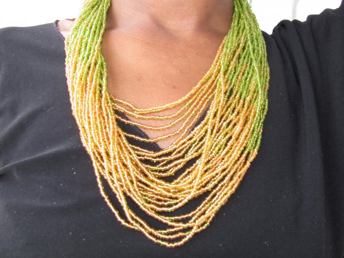 green and gold multi-string necklace