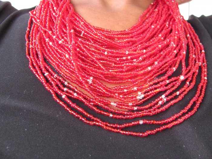 red multi-string necklace