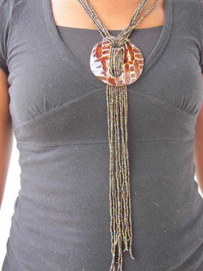 long brown multi-string necklace