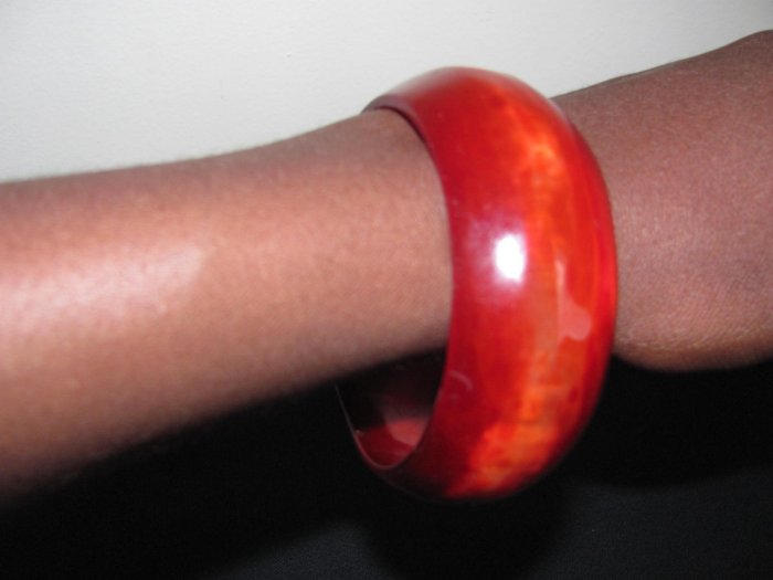 orange round bracelet