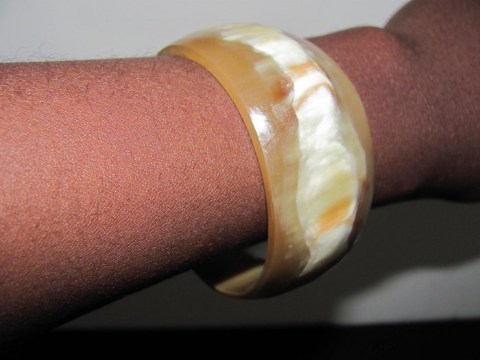 white and grey round bracelet