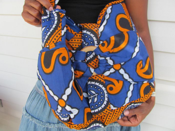 orange and blue hand bag