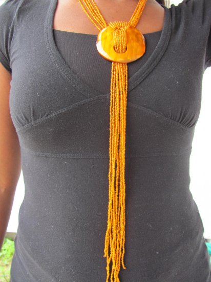 orange long multi-string necklace