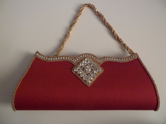 Red color Beaded border and Handle party clutch/purse