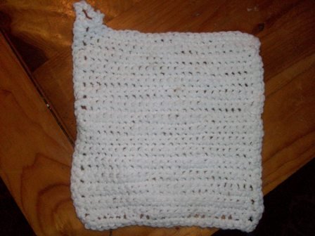 Crocheted white hand made potholder