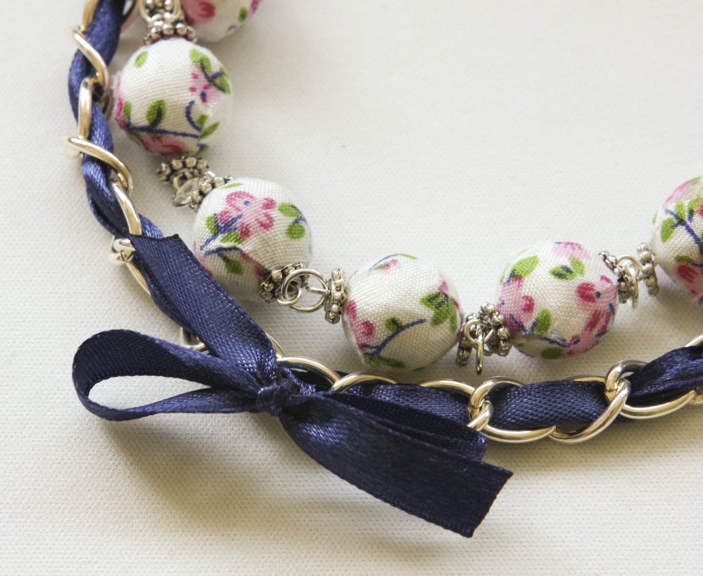 Cotton beads and blue satin ribbon bracelet