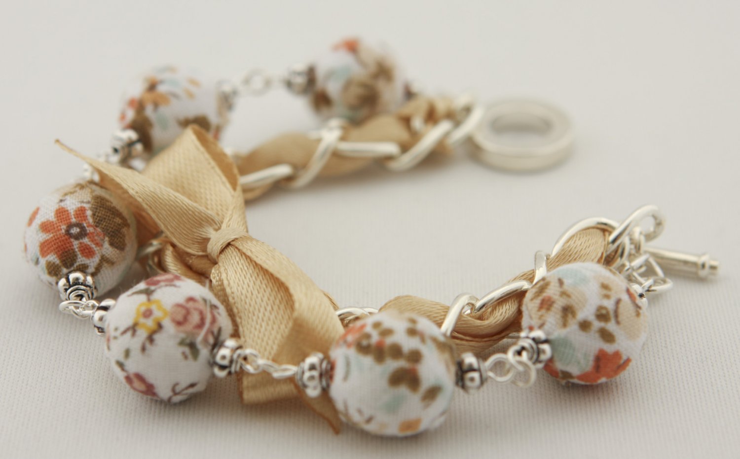 White floral cotton beads and eggshell satin ribbon bracelet