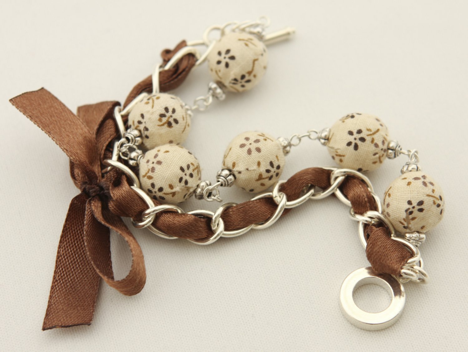 Cream floral cotton beads and brown satin ribbon bracelet