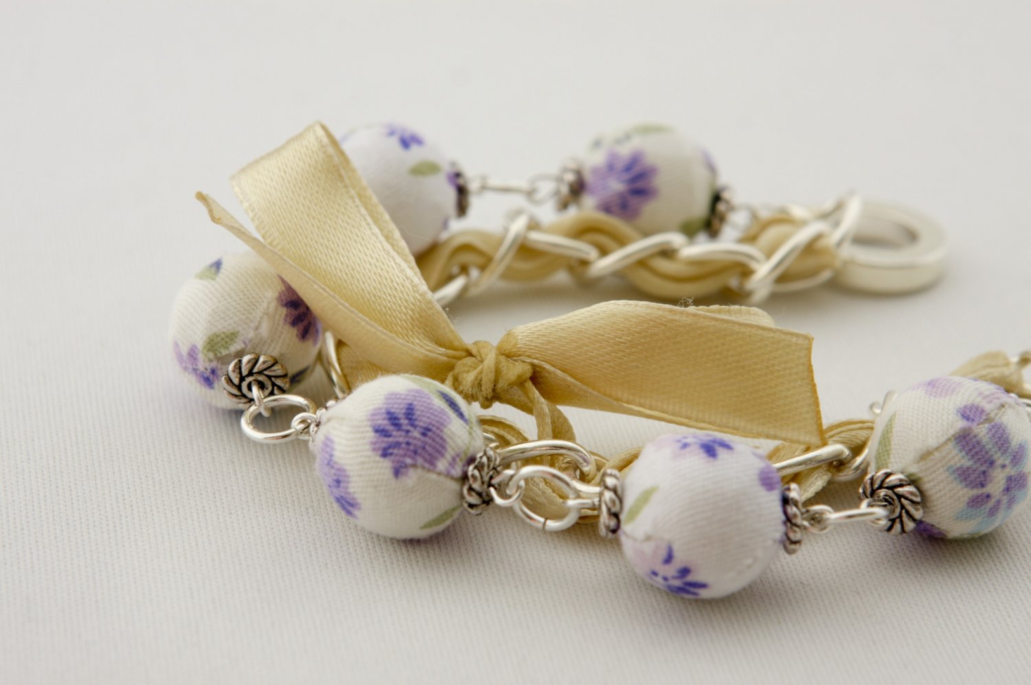 Violet cotton beads and eggshell satin ribbon bracelet