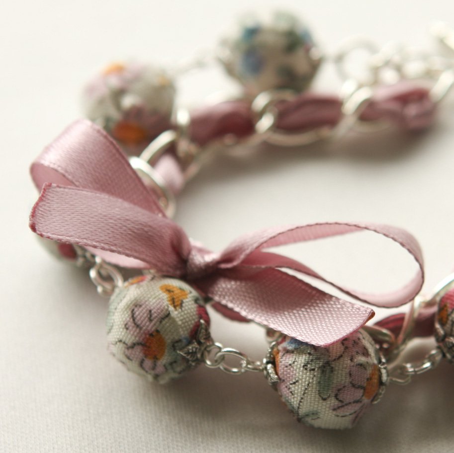 Cream fabric beads and lilac satin ribbon bracelet