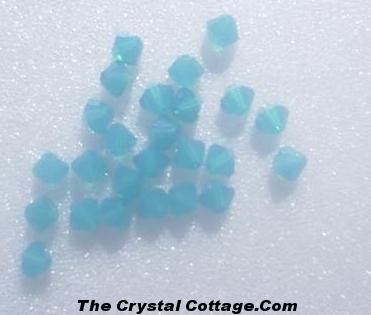 (20) Swarovski 4mm Bicone Crystal Beads ~Caribbean Blue Opal~