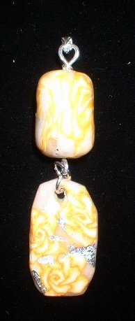 Yellow, White, and Silver Polymer Clay Pendant
