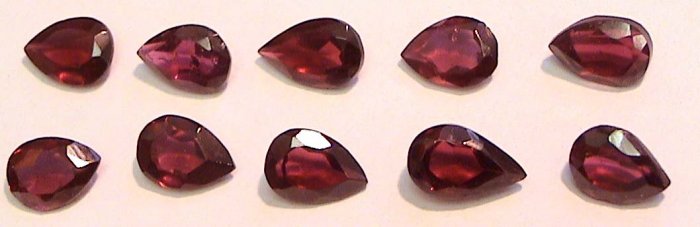 Set of FIVE 6 x 4 mm pear shaped Garnet Gems
