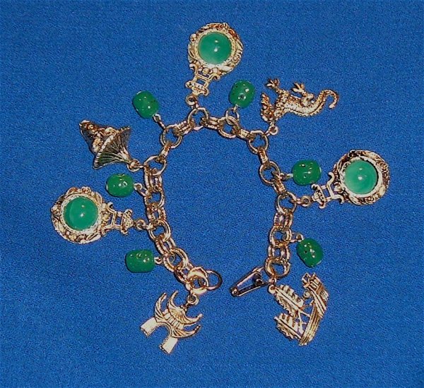 Vintage Bracelet Circa 1970s Oriental Designs with Green Glass