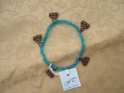 Blue Bracelet With Copper Charms
