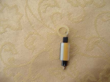 Yellow And Black Glass Bead Cell Charm