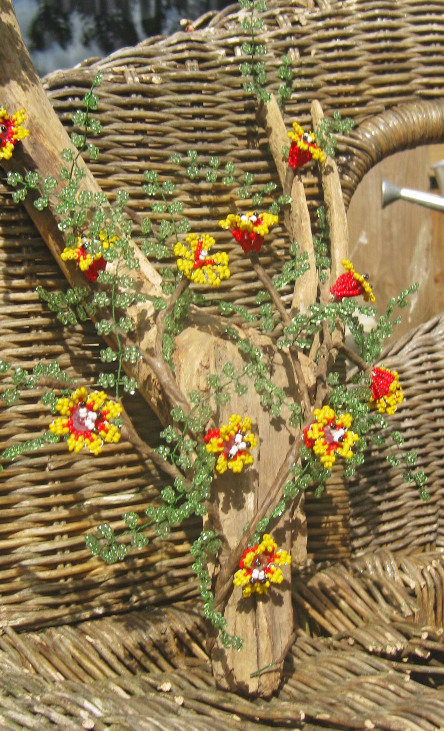 Beaded yellow flower on branch