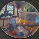 At the Tiled Stove Cat Plate by The Bradford Exchange