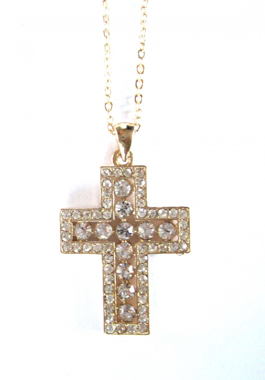 Gold cross with white crystals pendant on chain