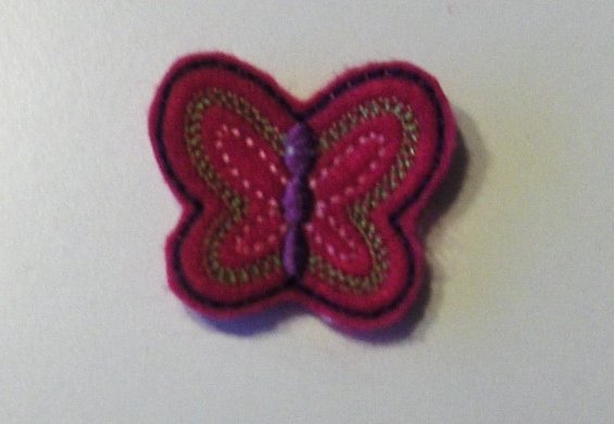 Pink felt embroidered butterfly clippies