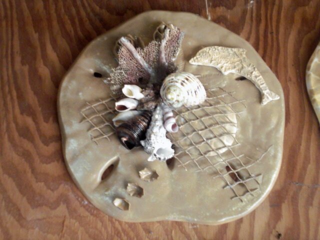 Sand Dollar Wall Plaque Sand Color with Dolphin accent
