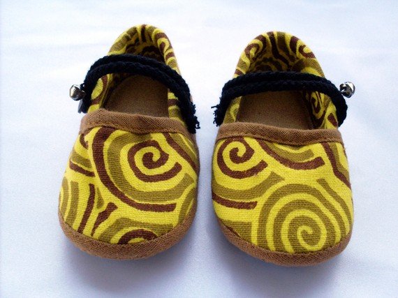 Funky colourful childrens shoes for boys or girls. Yellow and brown. Baby toddler small size