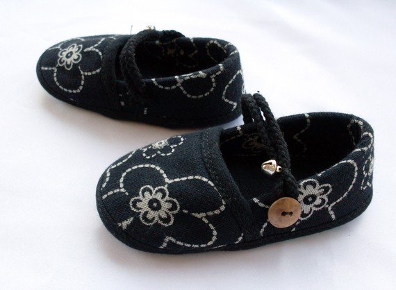 Funky colourful childrens shoes for boys or girls. Black and white. Baby toddler small size.