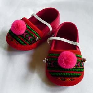 Funky colourful childrens shoes for both boys or girls. Red green pink. Baby small size