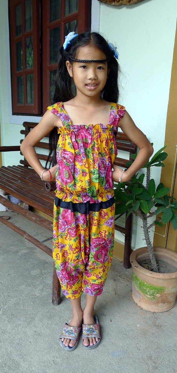 Funky colourful toddler childrens clothing. 5 years up. Adjustable size. Yellow 2 piece set.