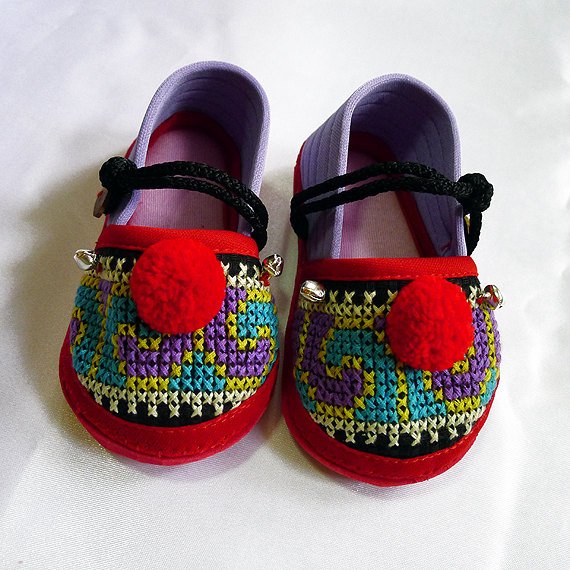 Funky colourful children's shoes for both boys or girls. Purple red blue. Toddler small size