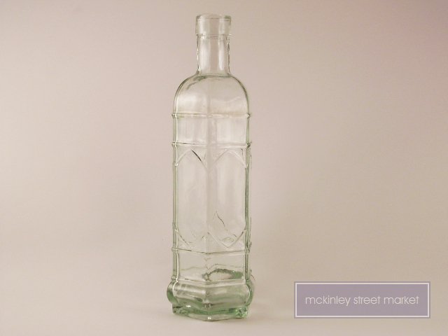 VINTAGE CLEAR 6 SIDED DECORATIVE GLASS BOTTLE 10 IN