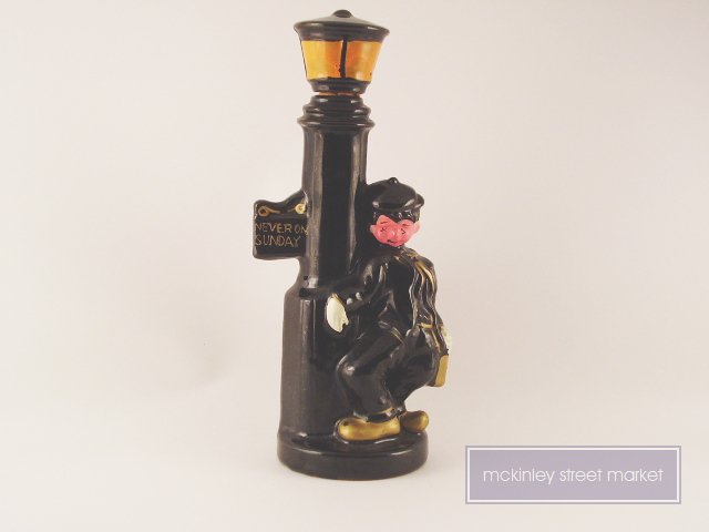 NEVER ON SUNDAY HOBO LAMP POST BOTTLE