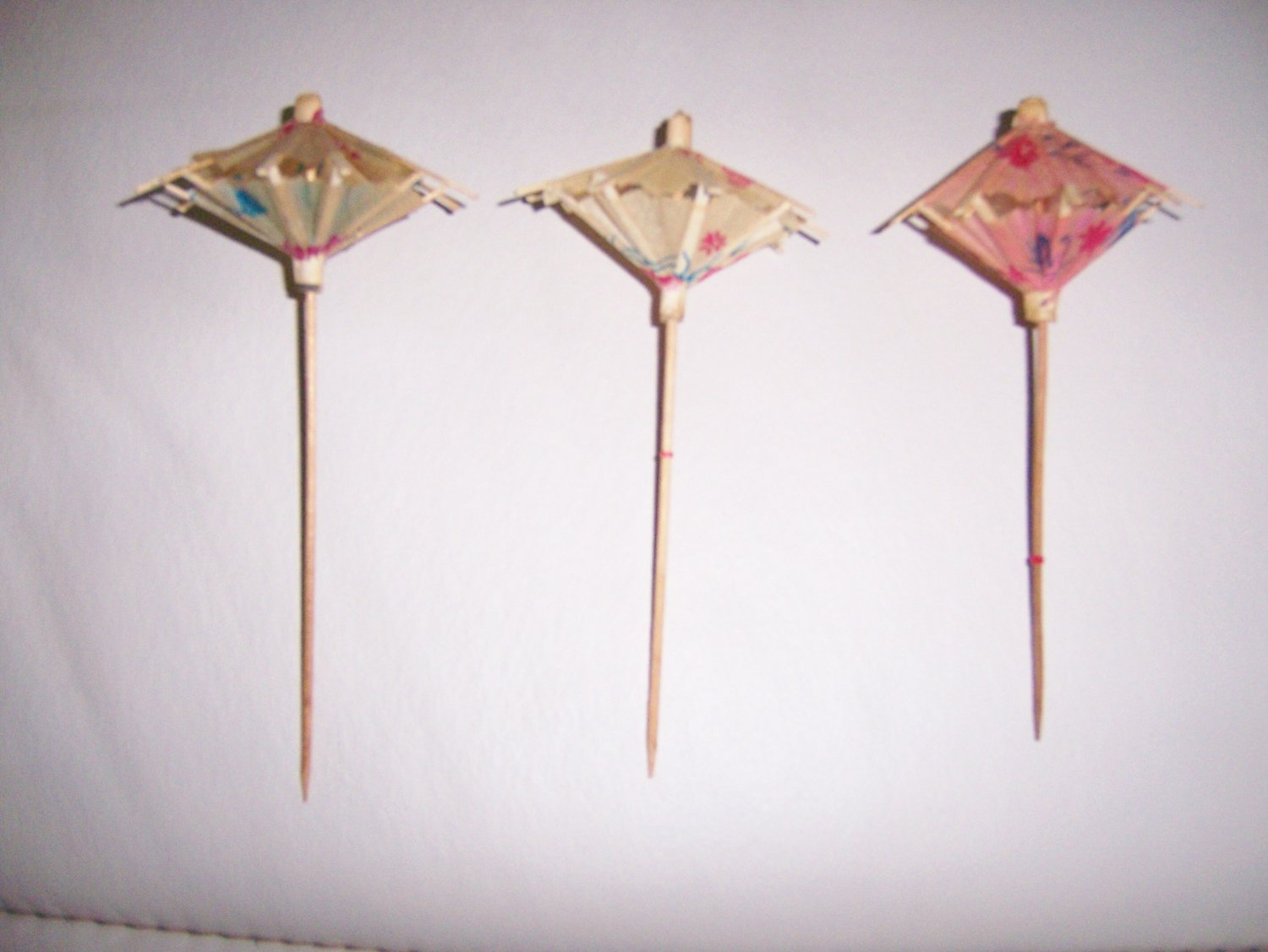 Three Umbrellas For Drinks