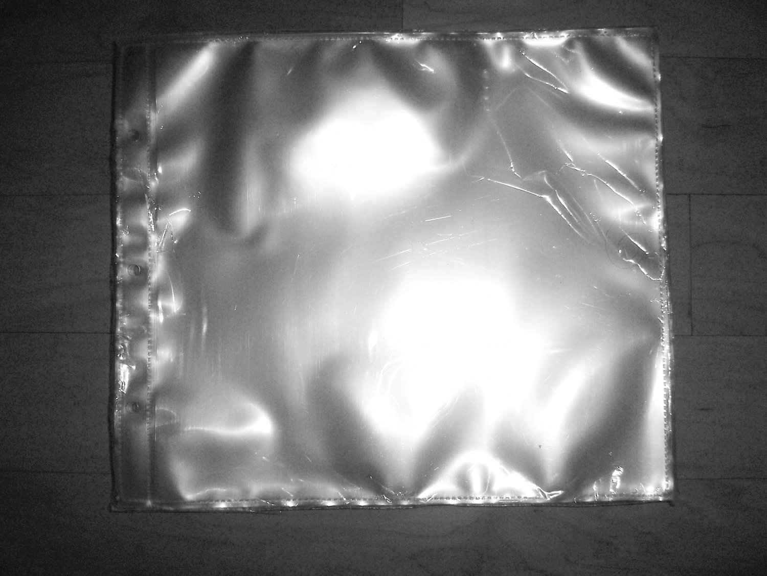 Clear Plastic Keepers 11x9 1/2" 3 Ring Punched BNK1572