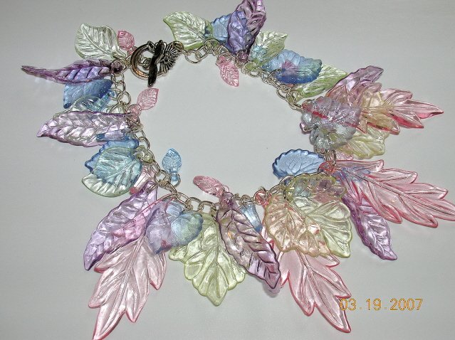 Charm Bracelet Loaded with Pastel Leaves. Great For Spring.