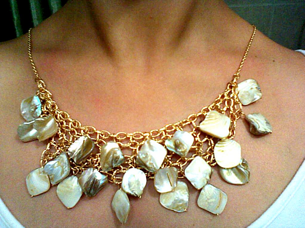 Gold chain necklace with stone clusteres
