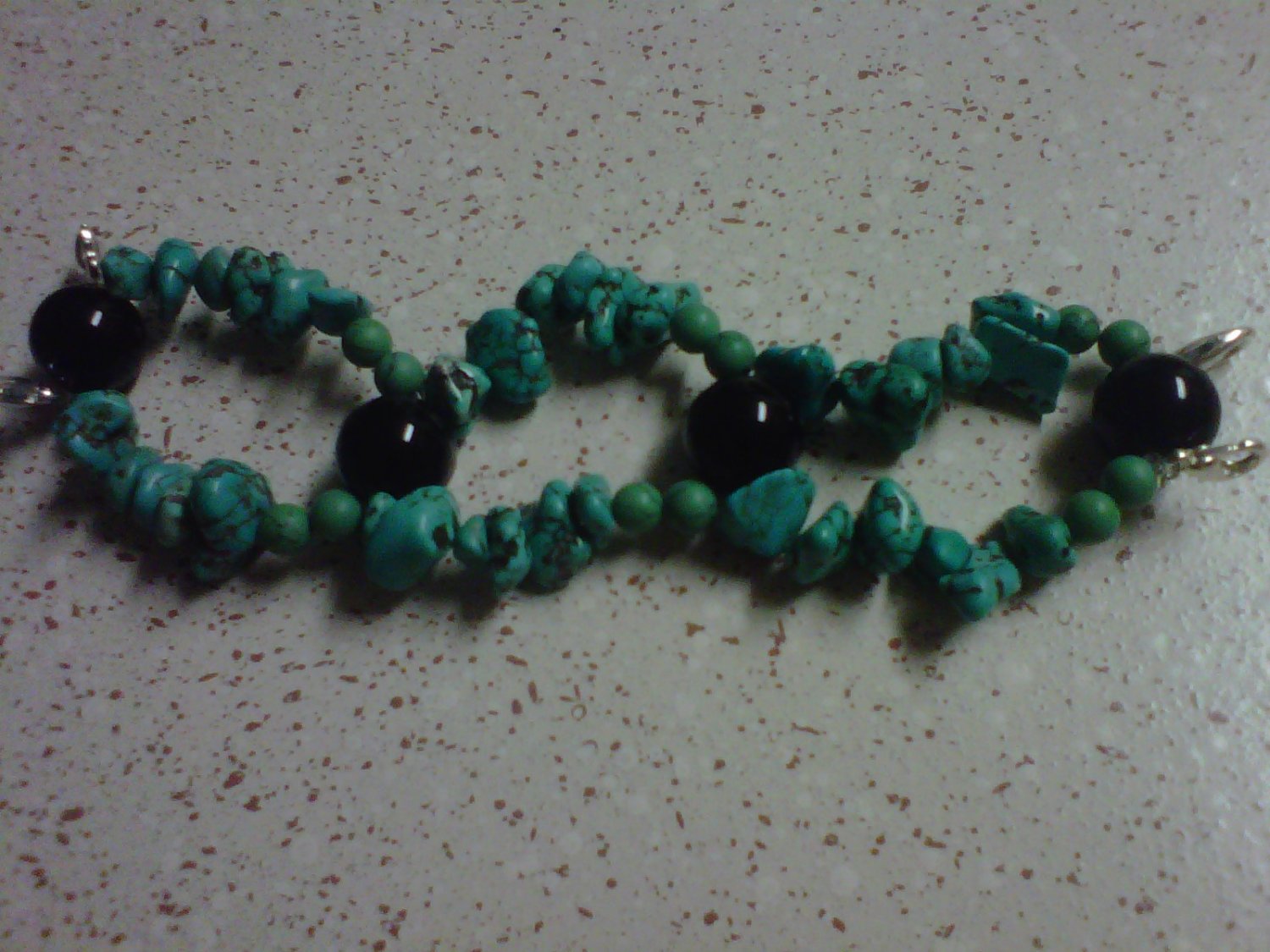 Turquoise and black interchangeable watch band