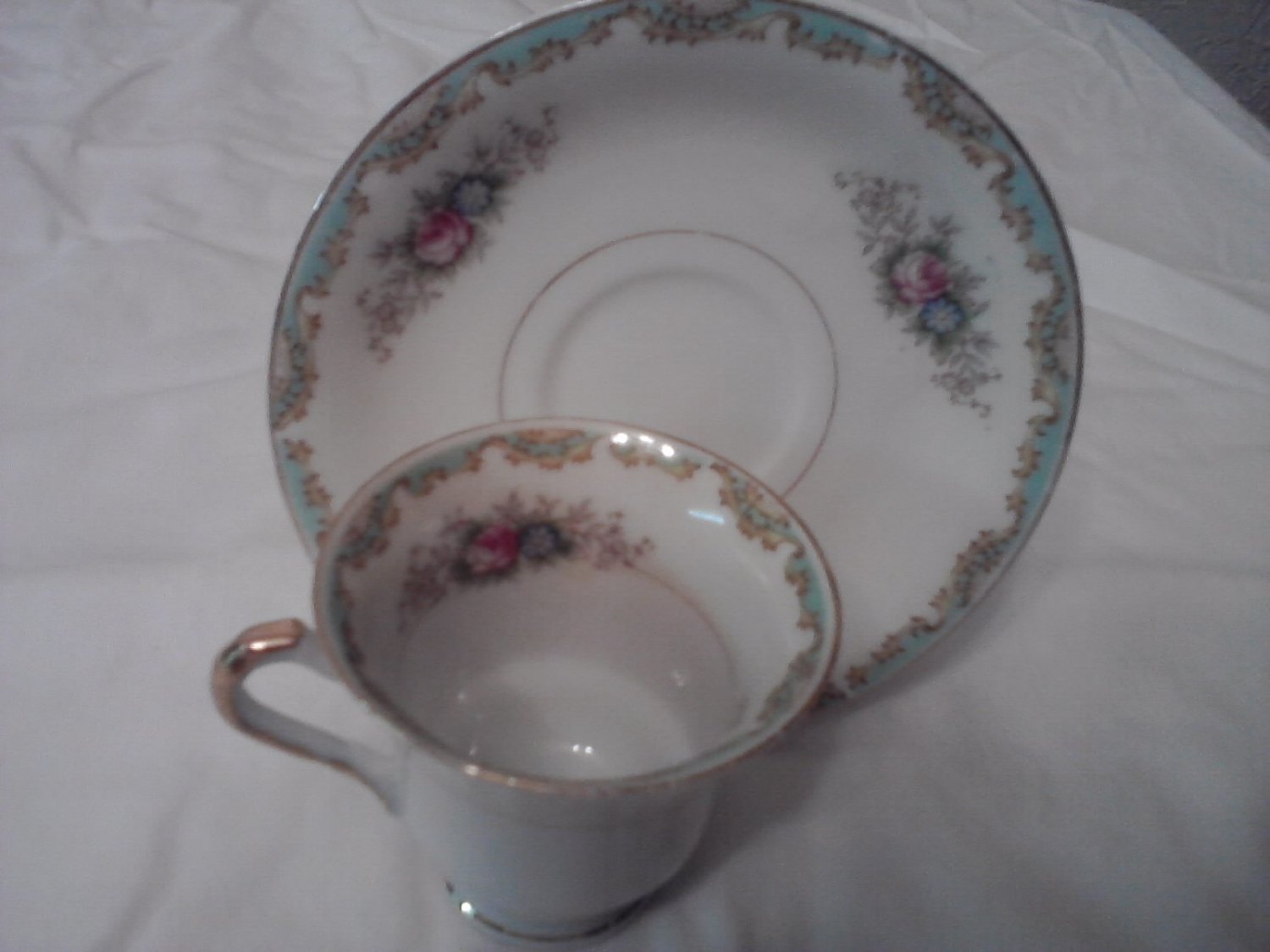 Vintage Hand painted Mini-teacup and saucer