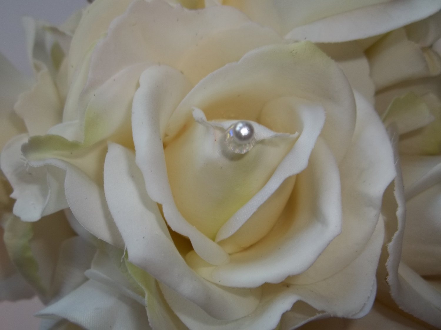 True touch Medium Round Bouquet. These look & feel like real Flowers. ( They are not silk.)
