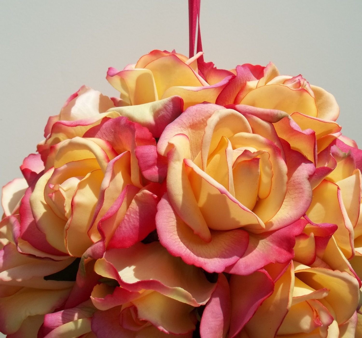 A Great Alternative to the Usual Bouquet is a hand carried Kissing Ball.
