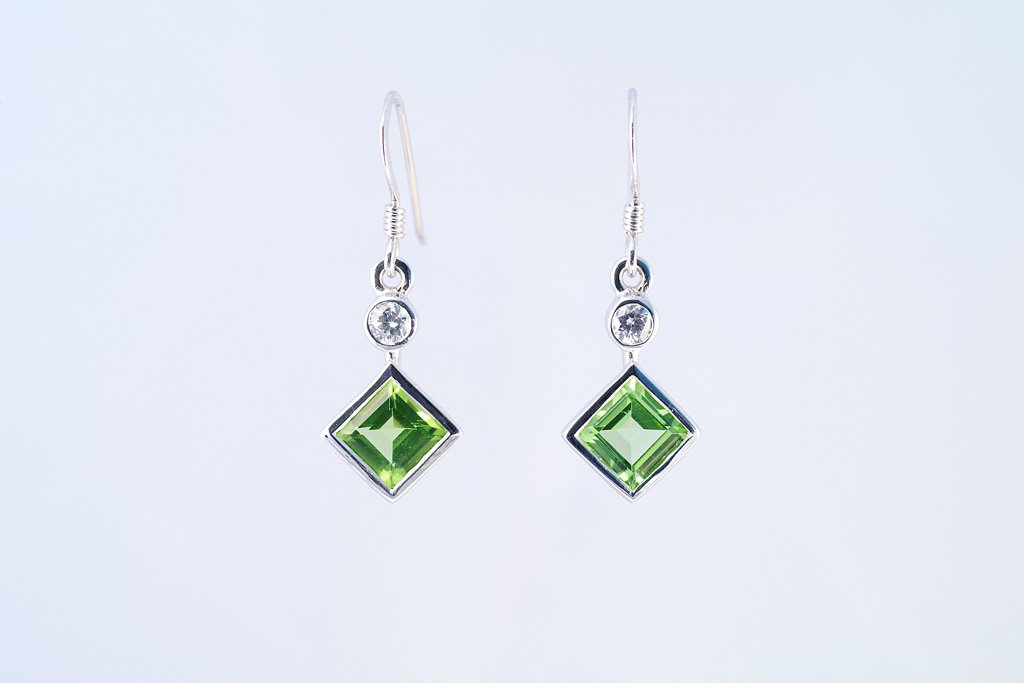 Peridot earrings w/ cz. 925 sterling silver W/G plated