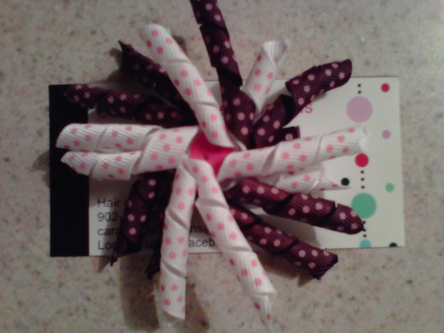 Brown and White Korker Clip With Pink Button