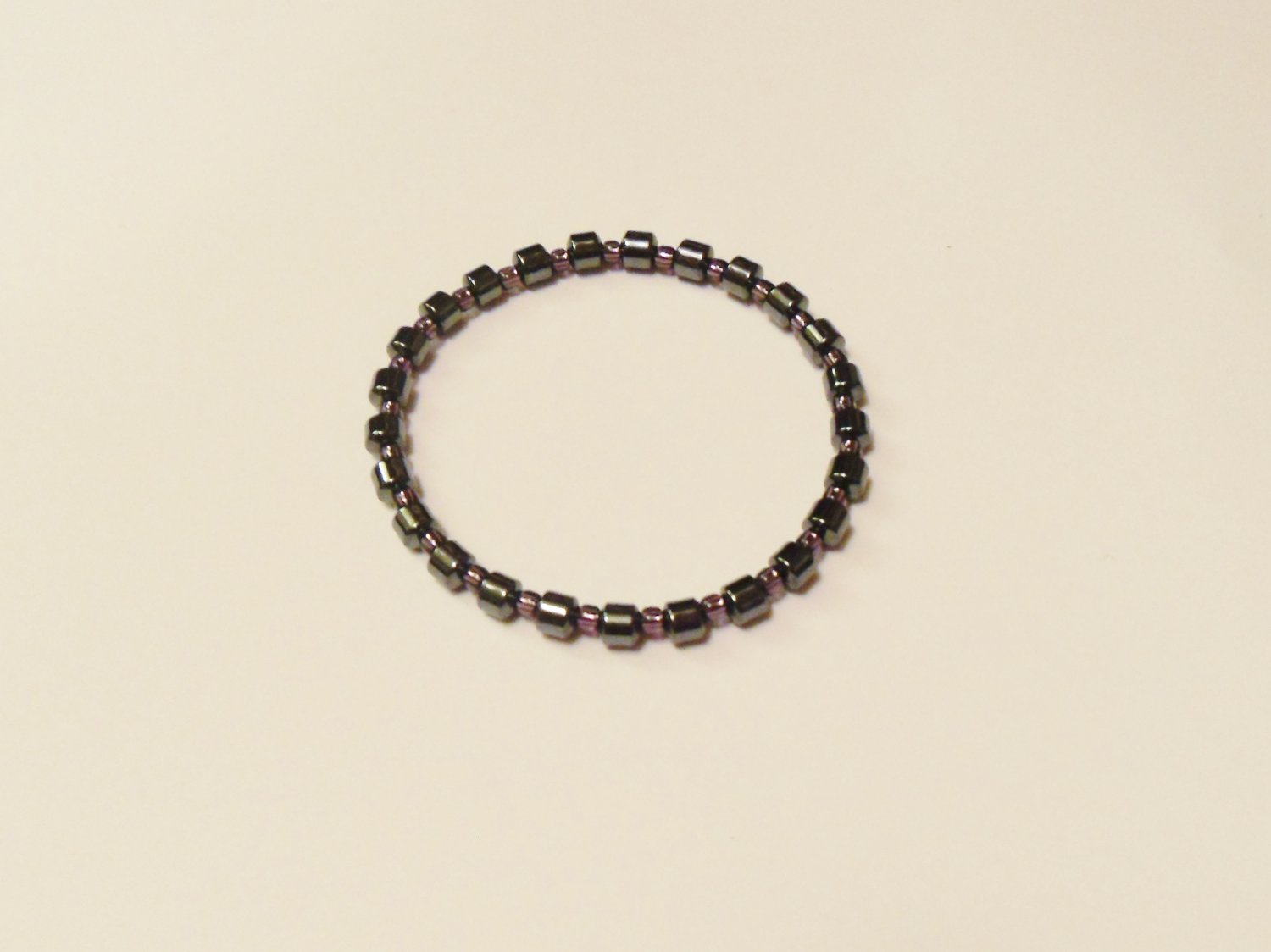 Hematite and clear purple surfer bracelet