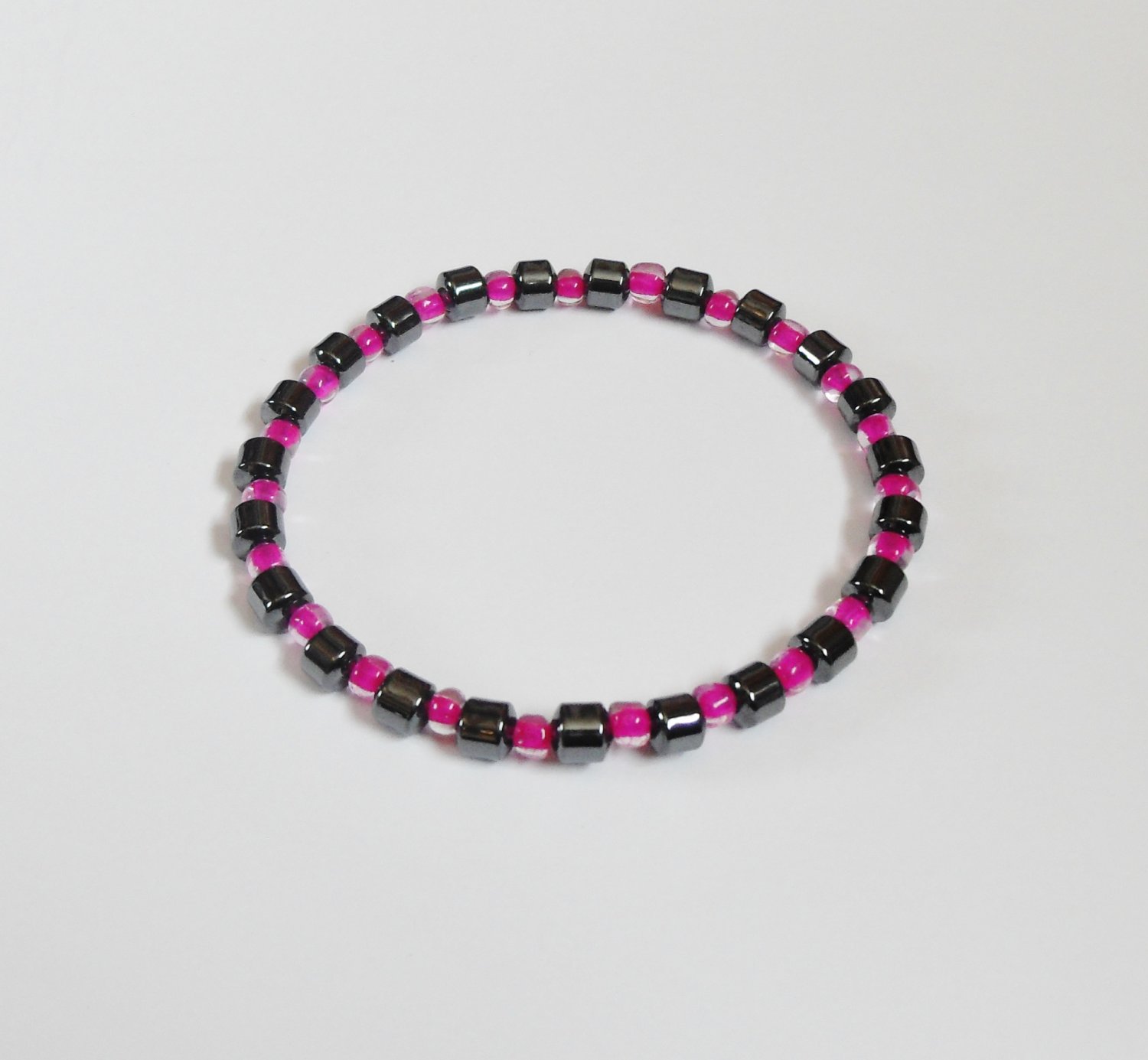 Hematite and clear dark pink surfer bracelet