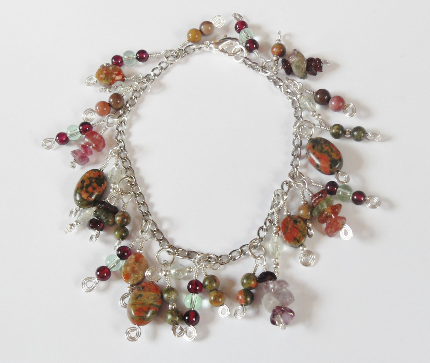 Unakite, garnet, and tourmaline charm bracelet